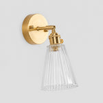 Bild in Gallery-Viewer laden, Clear glass wall light with brass arm, KZ shade 12 cm high and 13 cm diameter