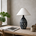 Load image into Gallery viewer, Black ceramic table lamp on a desk or console
