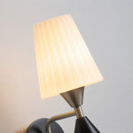 Cargar imagen en el visor de la Galería, Glass shade and wall arm detail of matte nickel wall sconce