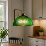 Bild in Gallery-Viewer laden, Emerald green ribbed glass pendant installed above a kitchen counter