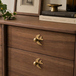 Cargar imagen en el visor de la Galería, Swallow-shaped brass handles on wood drawers