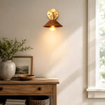 Load image into Gallery viewer, Hand-carved wall sconce installed above a console table