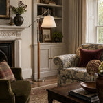 Cargar imagen en el visor de la Galería, Swing arm fabric floor lamp near a fireplace seating area