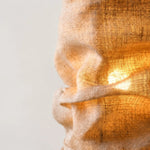 Load image into Gallery viewer, Close-up of gathered burlap texture and warm glow