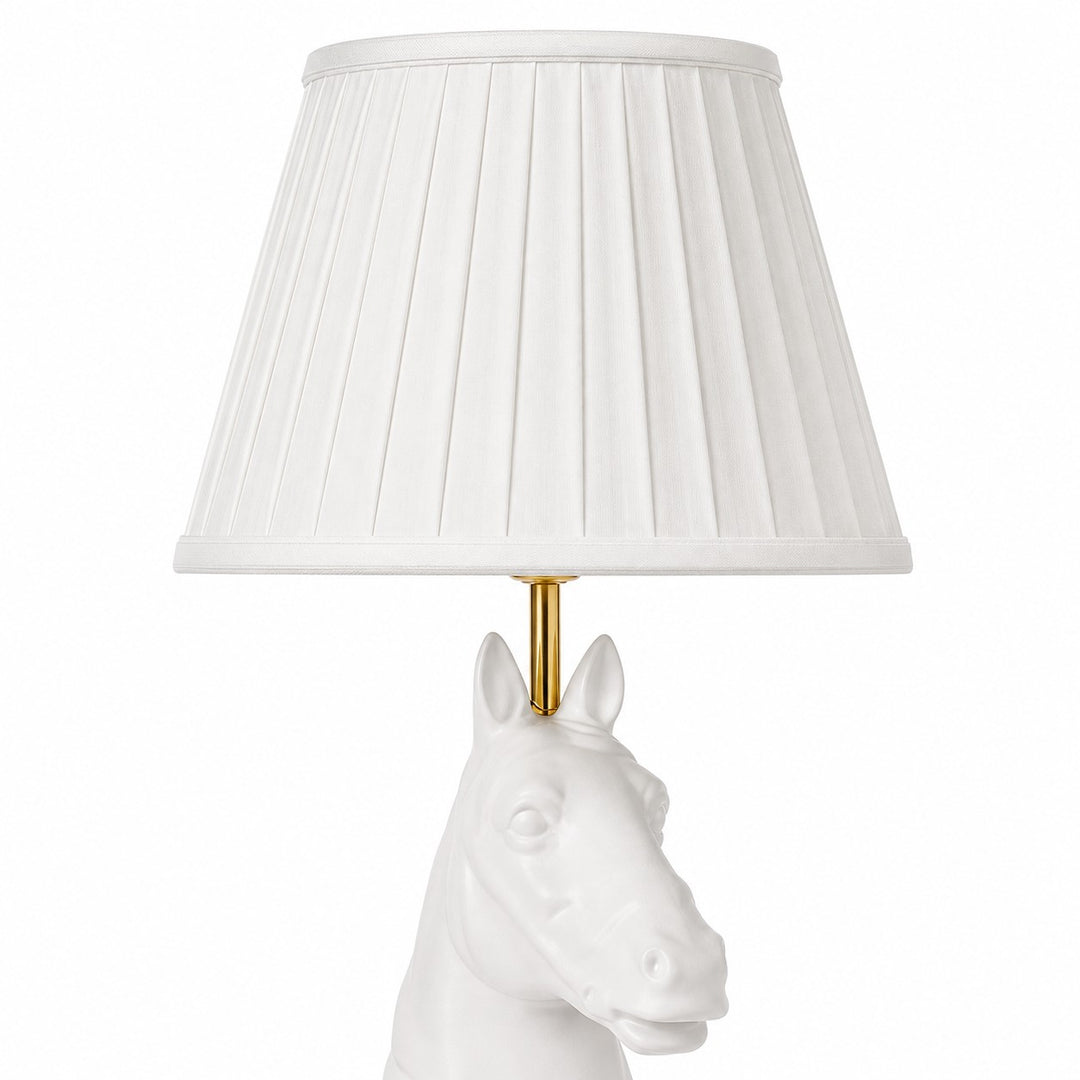 Close detail of fabric shade and lamp neck