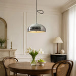 Charger l'image dans la visionneuse de galerie, Adjustable chrome pendant light installed over a round dining table