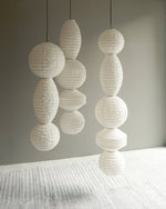 Bild in Gallery-Viewer laden, Stacked Ribbed Paper Swag Pendant Light