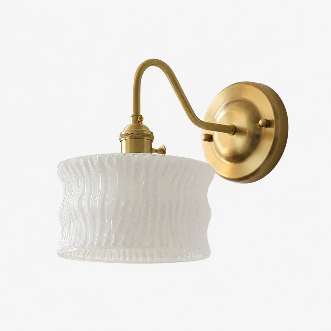 Frosted white ripple glass wall sconce with brushed brass arm