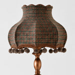 Bild in Gallery-Viewer laden, Close-up of blue orange check pleated shade with scalloped edge and pom-pom trim