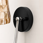 Bild in Gallery-Viewer laden, Close view of black wall plate and chrome curved arm