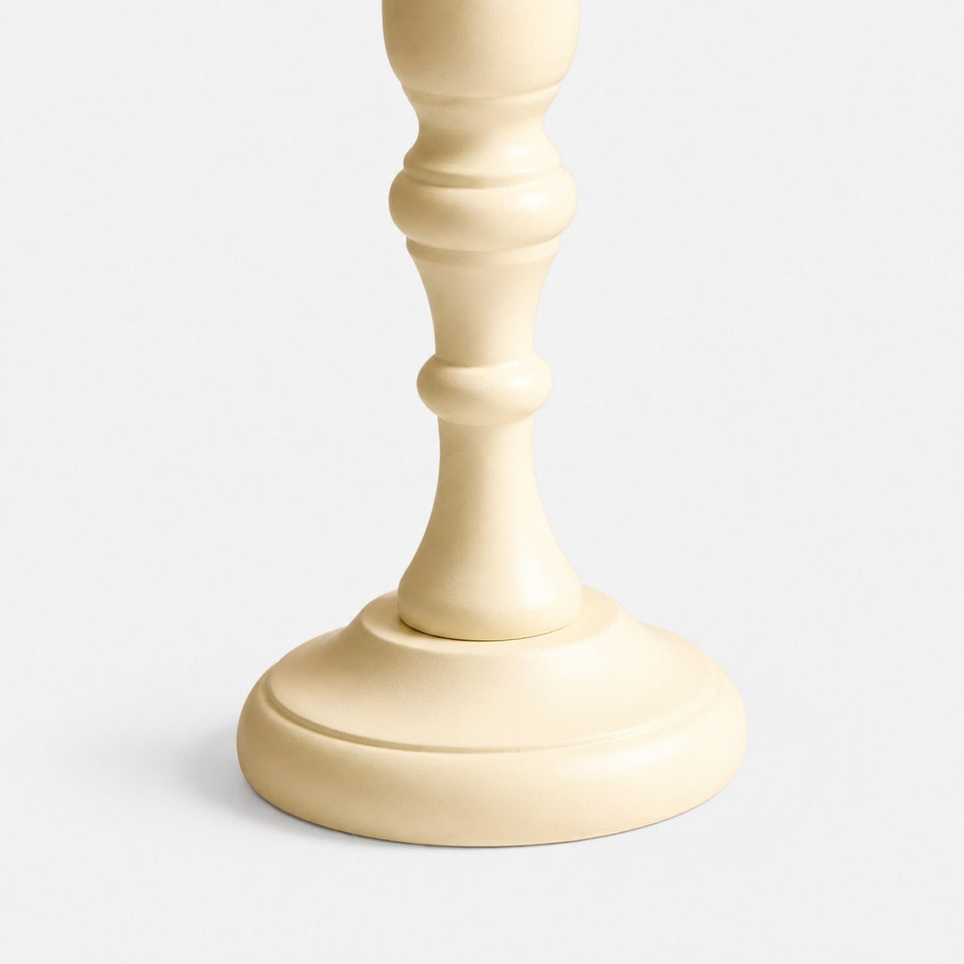 Close view of the carved wood base
