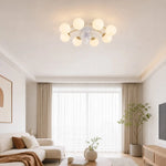 Bild in Gallery-Viewer laden, White and gold ceiling fan light in a modern living room