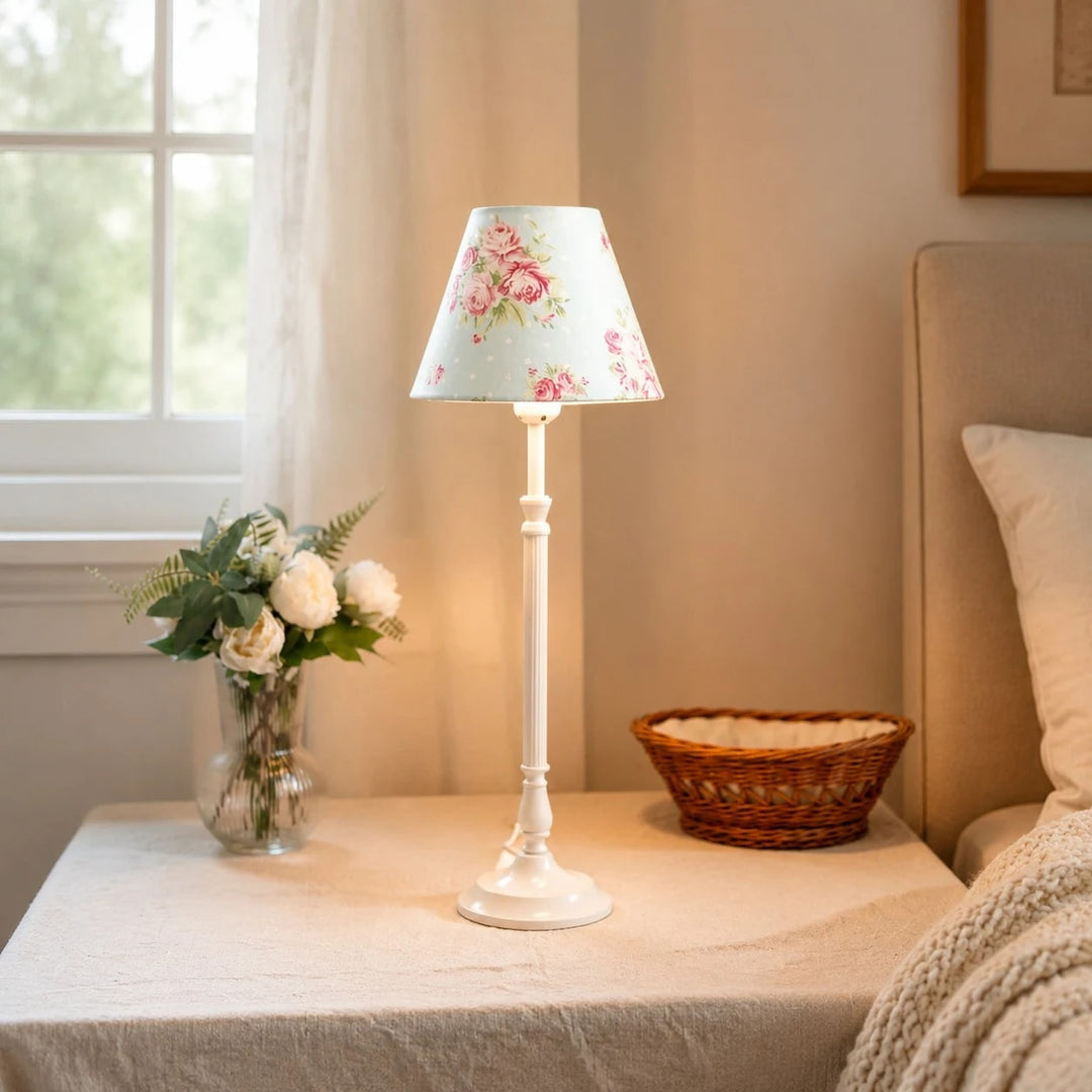 Blue floral French country table lamp on a side table