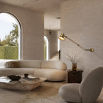 Cargar imagen en el visor de la Galería, Satin Brass folding wall lamp in a modern living room