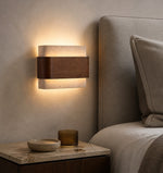 Bild in Gallery-Viewer laden, Travertine wood wall light beside a bedroom headboard