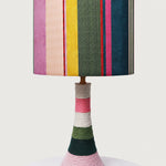 Charger l'image dans la visionneuse de galerie, Close view of the colorful striped fabric shade and cotton-wrapped ceramic base