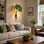 Load image into Gallery viewer, Botanical wall light in an exterior setting