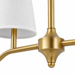 Bild in Gallery-Viewer laden, Brass finish detail with white fabric shade and branch arm