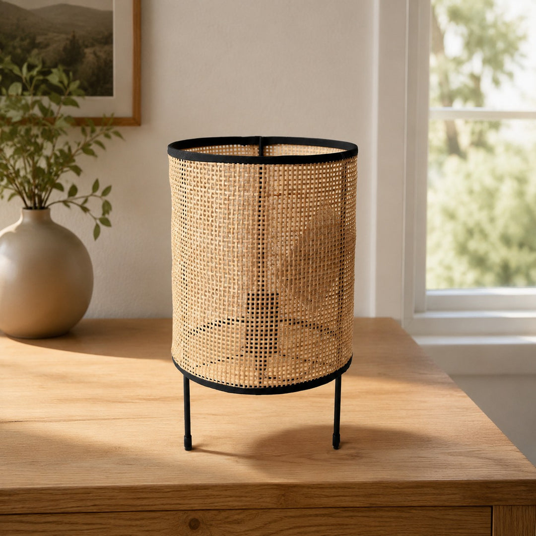 open weave natural rattan LED table lamp on wooden table
