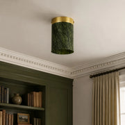 vintage green and gold ceiling light installed in an entryway
