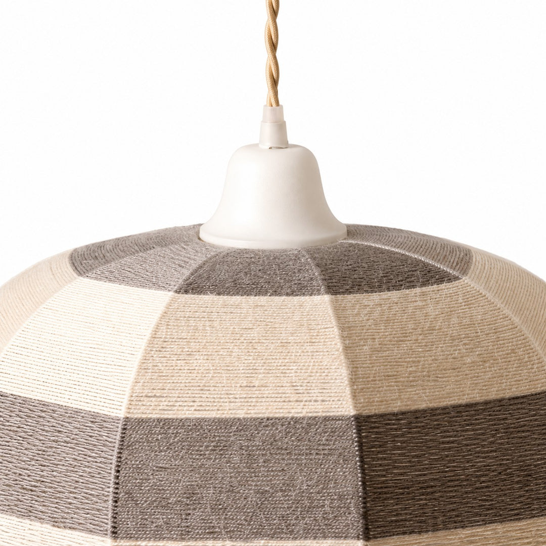 Close-up of white ceiling cup and hand-wrapped cotton thread shade