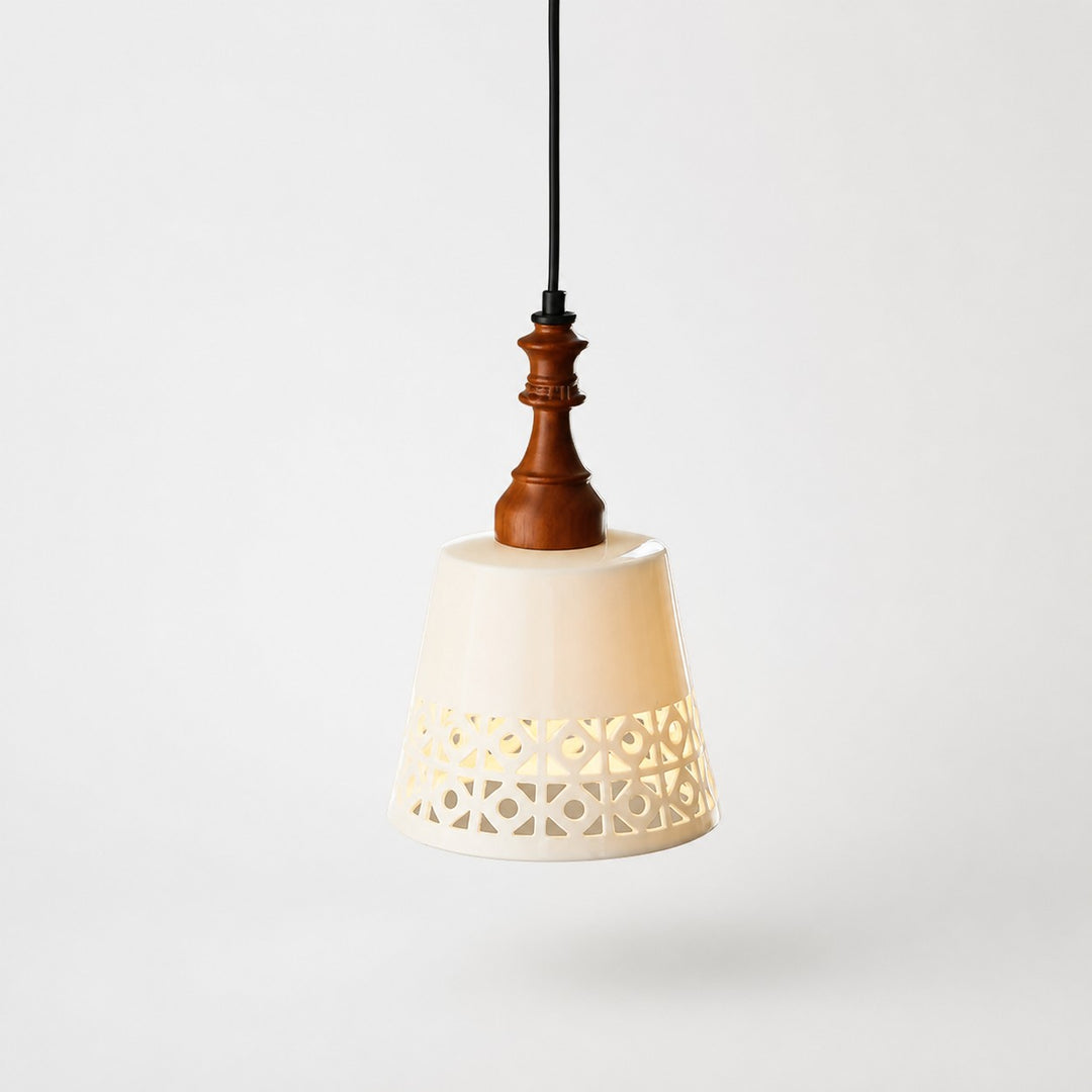 cutout ceramic shade pendant light on gray background
