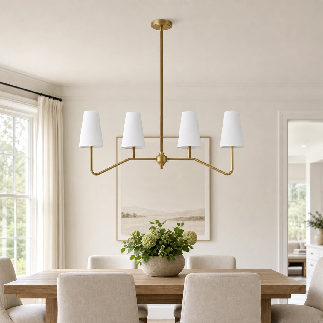 Strellux brass linear chandelier in a dining room setting
