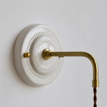 Bild in Gallery-Viewer laden, ceramic wall plate and brass arm detail