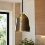 Load image into Gallery viewer, Hand-carved brass pendant lighting in an interior