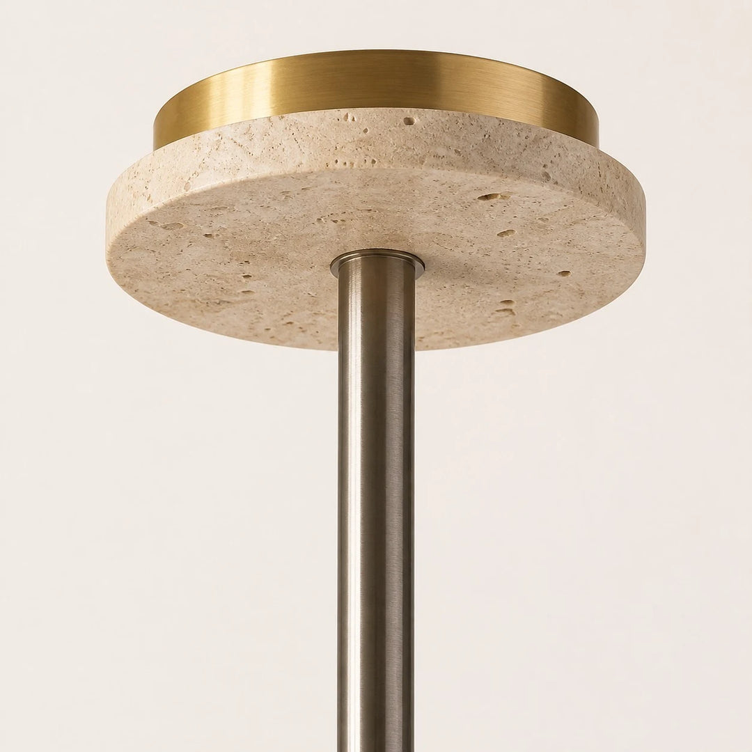 Close view of the travertine ceiling canopy and metal suspension rod
