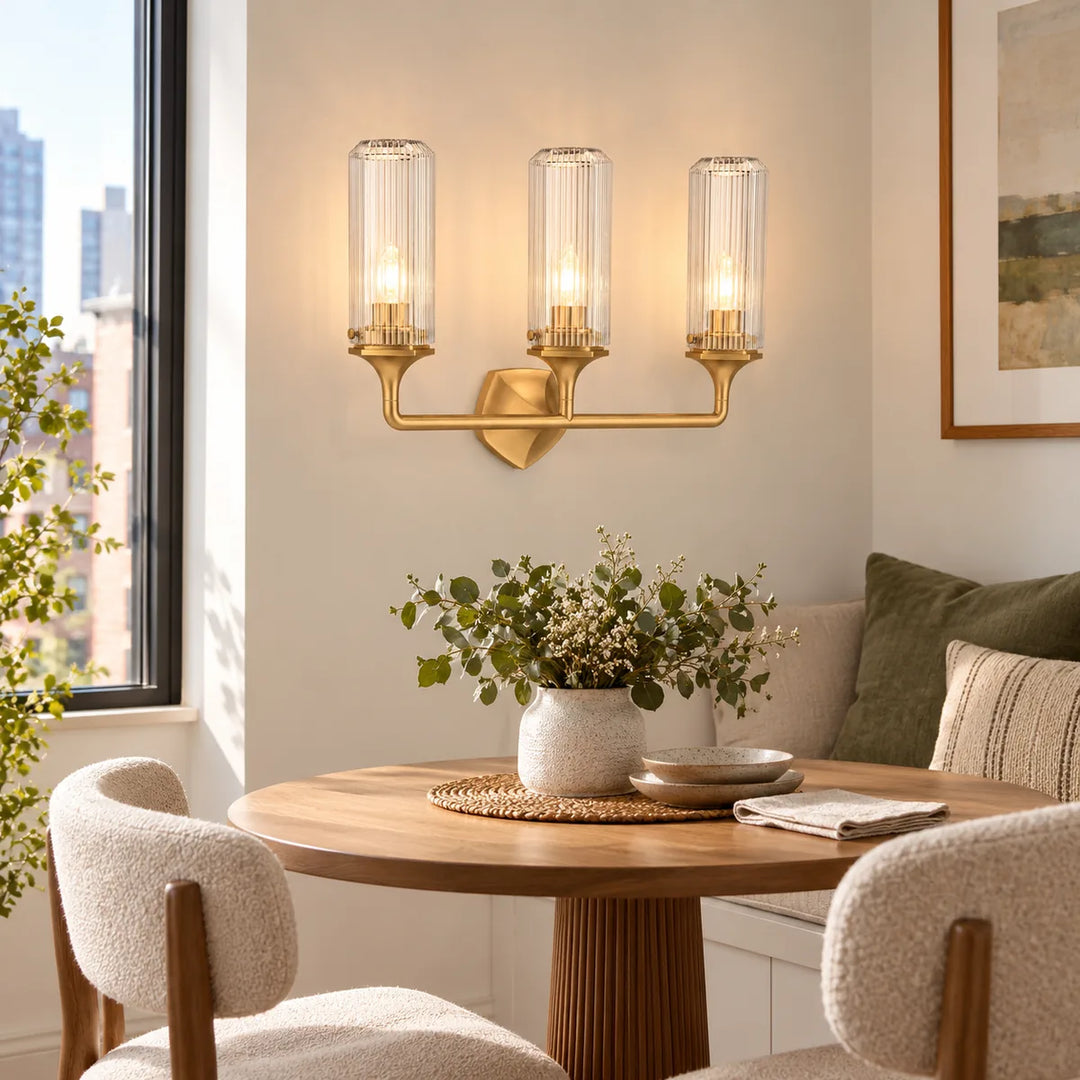 Compact Armed Sconce with Fluted Cylinders