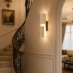 Charger l'image dans la visionneuse de galerie, Travertine wall lamp installed beside a staircase wall