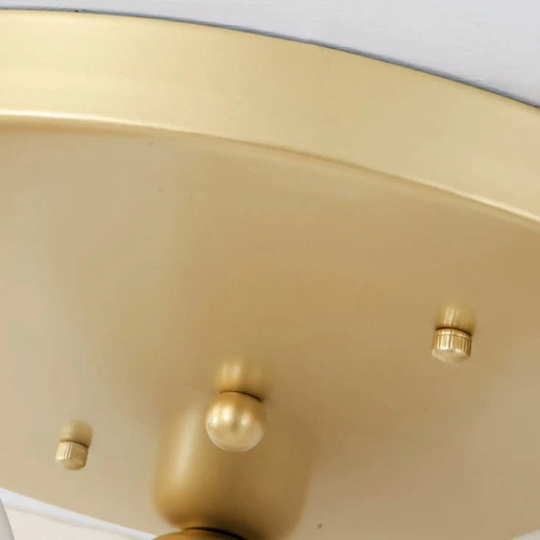 Gold ceiling canopy and mounting hardware detail