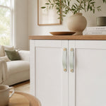 Load image into Gallery viewer, Cowhide leather and brass cabinet pull handle detail and lifestyle image