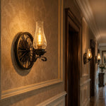 Cargar imagen en el visor de la Galería, Black two-head wall sconce lighting a paneled hallway