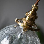 Load image into Gallery viewer, Crackled Glass Globe Brass Pendant Light