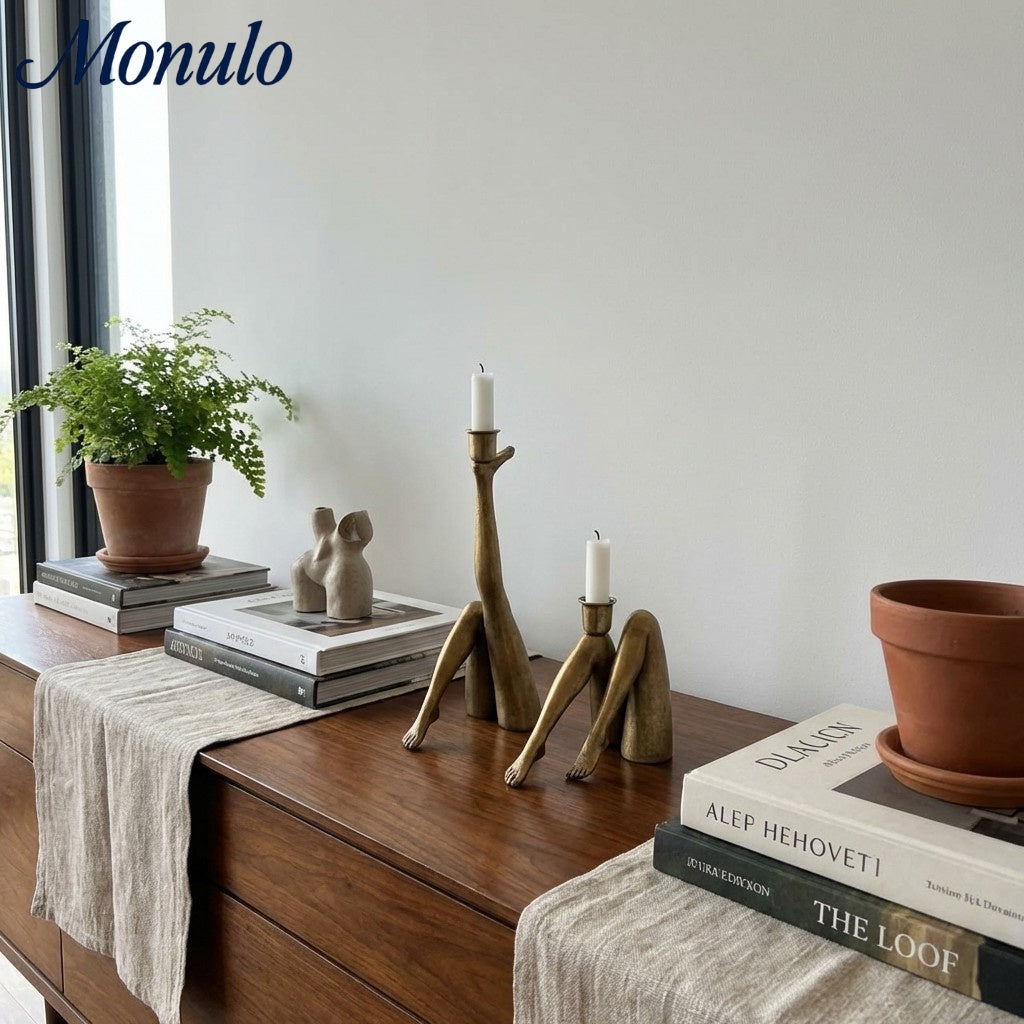 Base de vela dorada escultórica Kickra - Decoración para comedor y sala