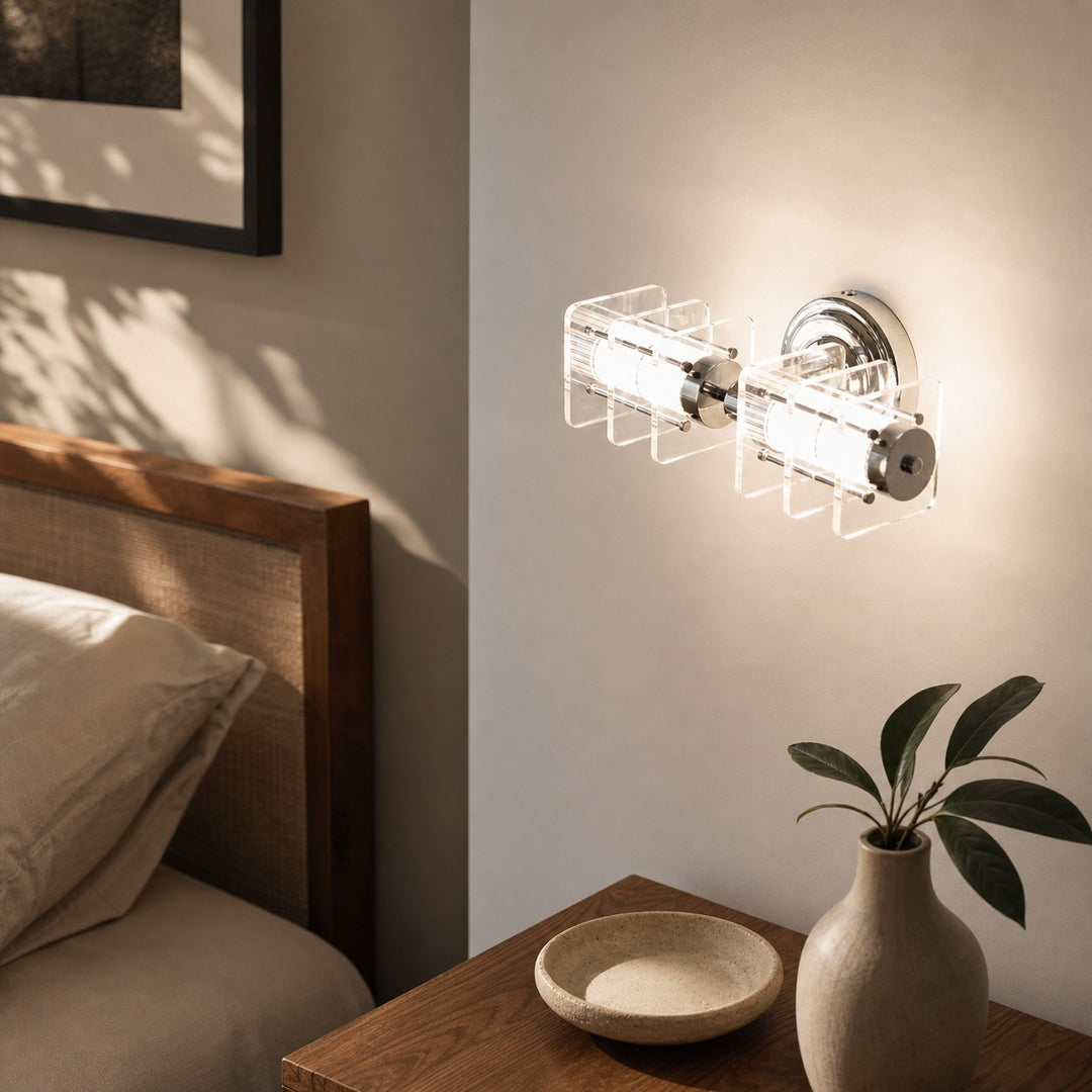Horizontal Bauhaus acrylic chrome wall lamp installed beside a bed