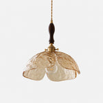 Cargar imagen en el visor de la Galería, Single amber pressed-glass flower pendant with walnut accent
