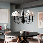 Load image into Gallery viewer, Five-light polka dot chandelier installed above a round dining table