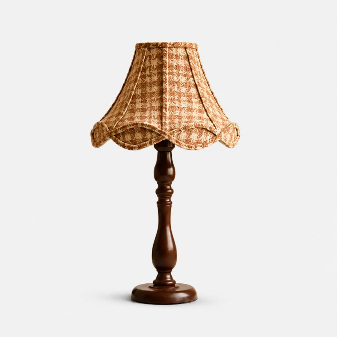 Vase-shaped base vintage wood table lamp on white background