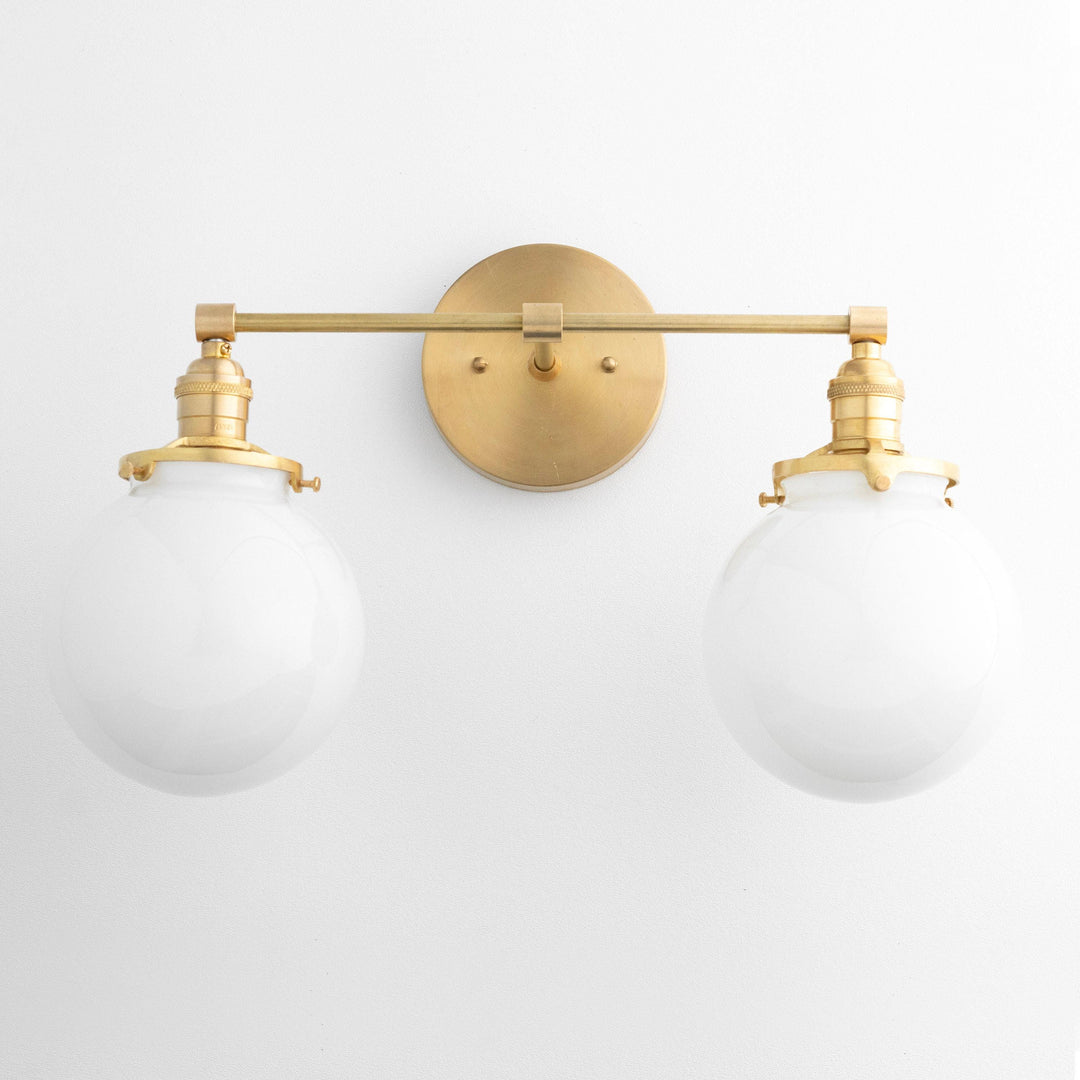 Lumio Globe Glass Globe Vanity Light - Modern Two Light Bathroom Sconce