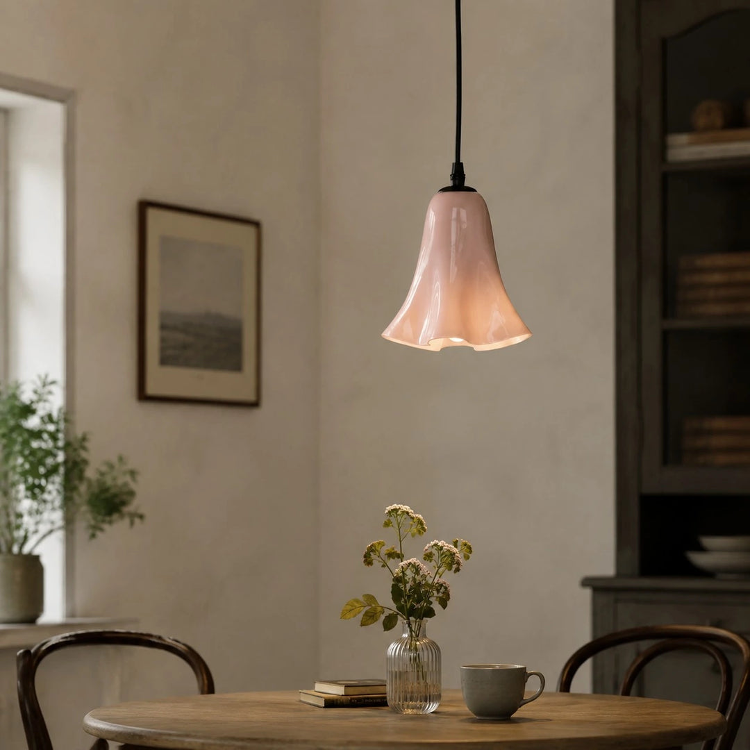 Blush pink glass pendant light illuminated with a customer-supplied bulb