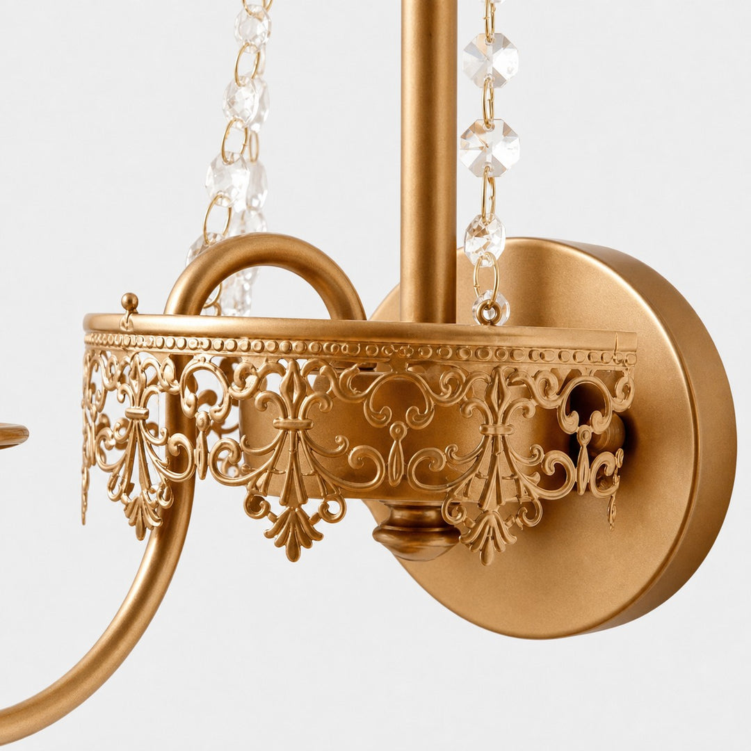 Close view of the pierced metal trim crystal strands and round wall plate