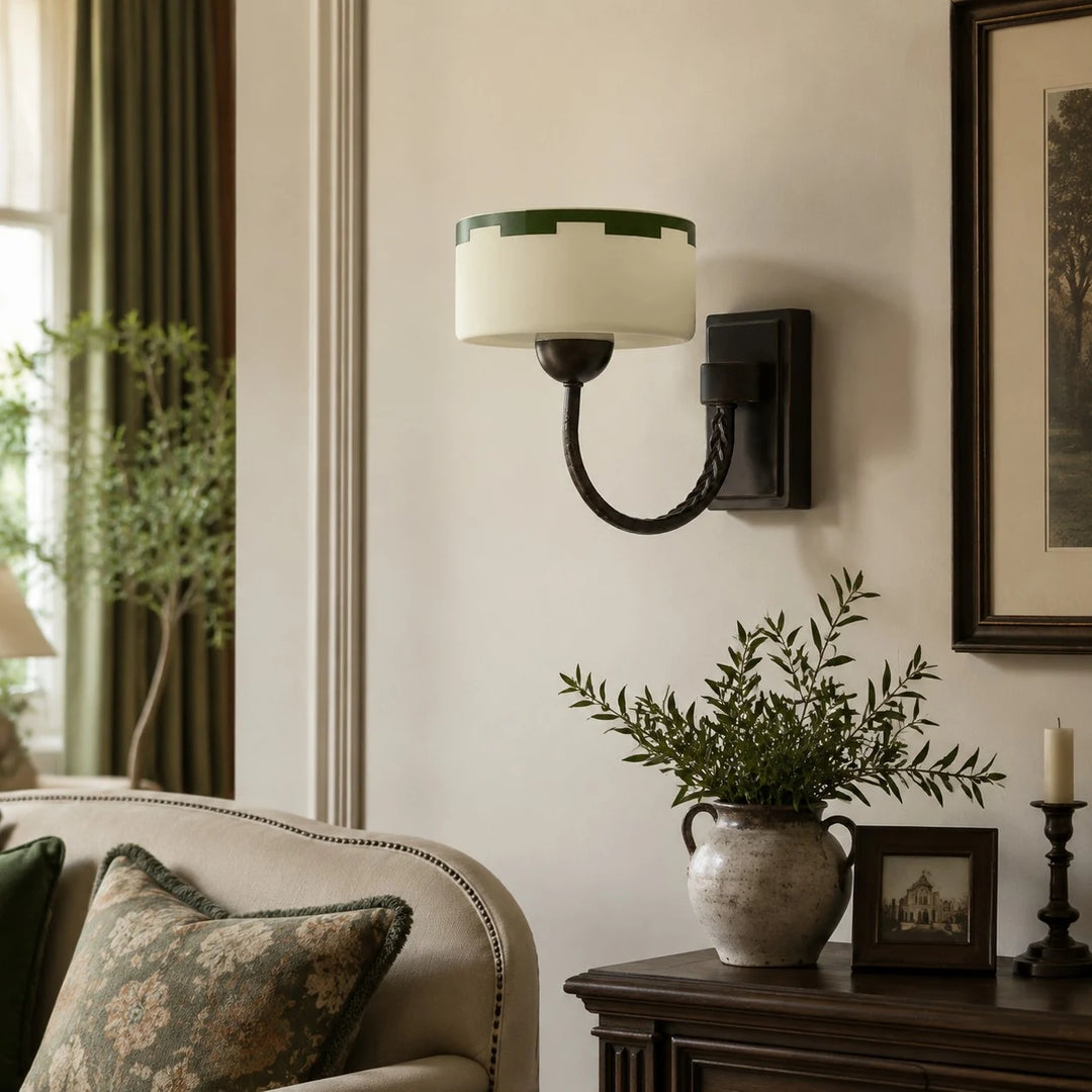 Vintage wall sconce in a styled corner installation