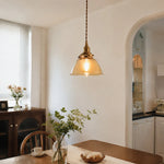 Cargar imagen en el visor de la Galería, Amber glass pendant in a soft entry scene