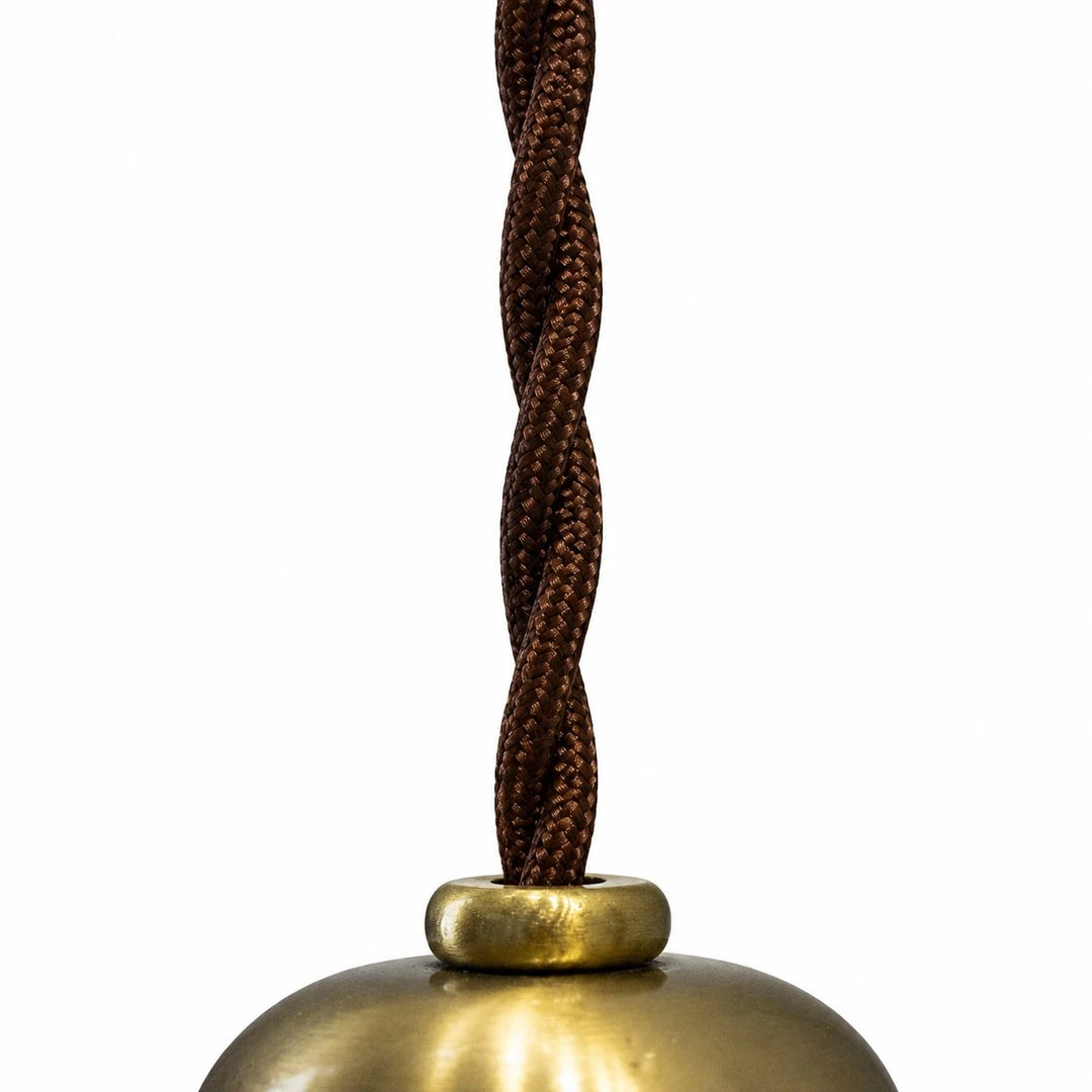 Braided cord and brass pendant lamp hardware detail