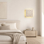 Load image into Gallery viewer, Travertine square wall light illuminating a hallway or living room wall