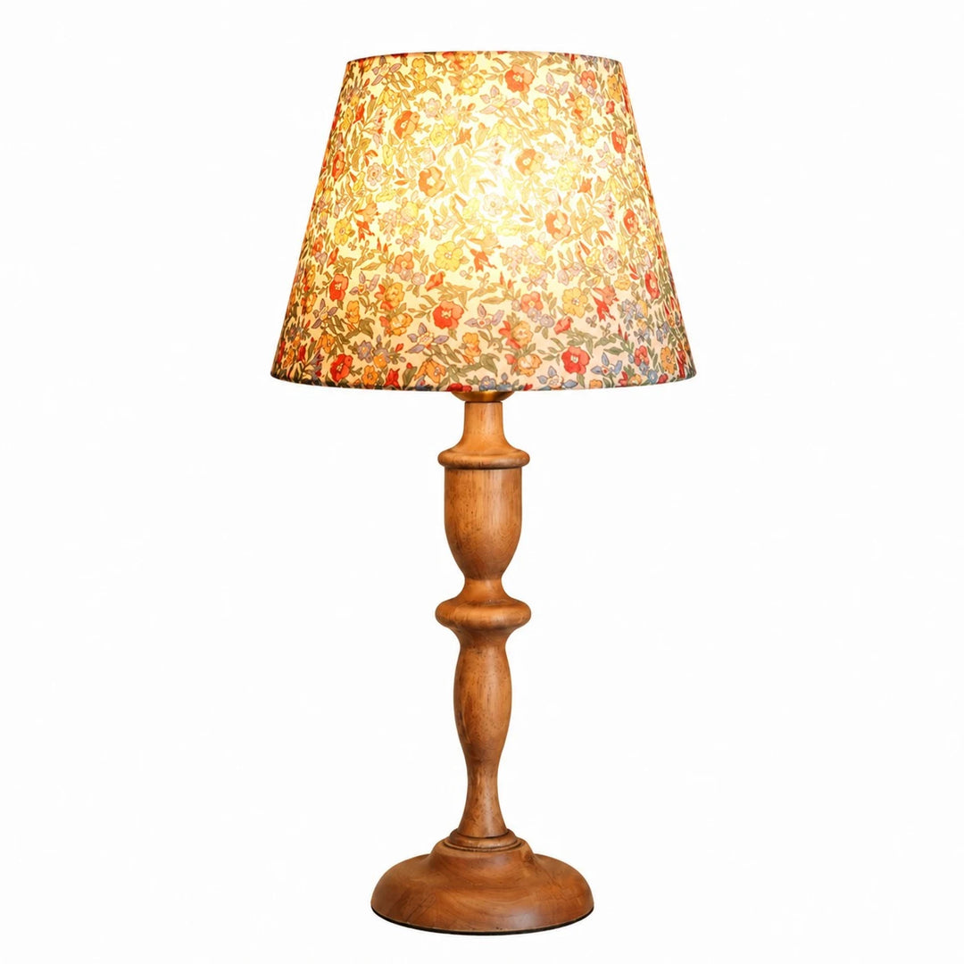 Lit floral shade full lamp view