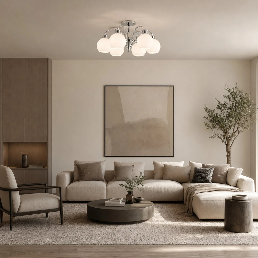 Glass globe chandelier in a neutral living room